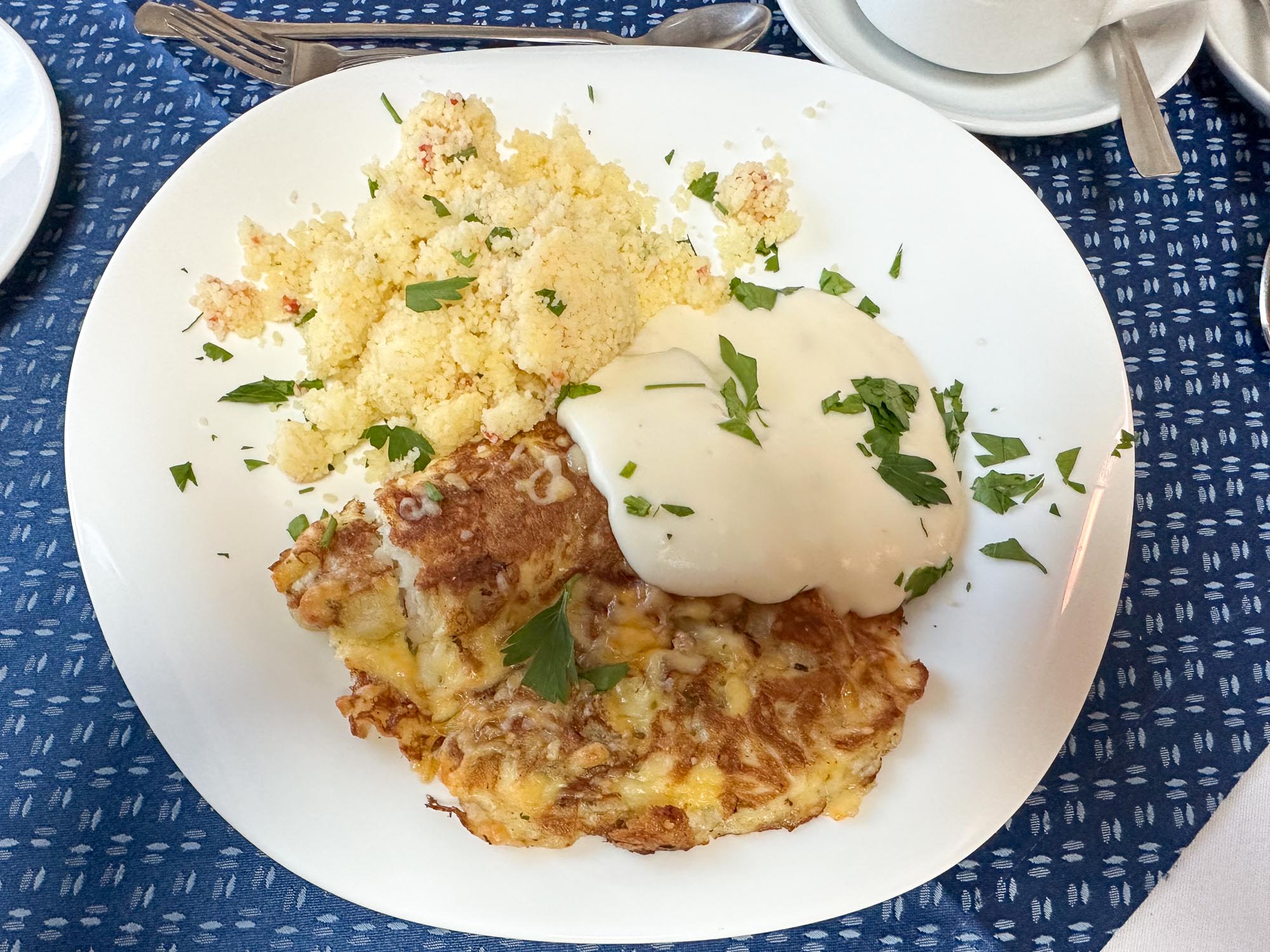 Рыба воздушная с кус-кусом, овощами и сырно-сливочным соусом